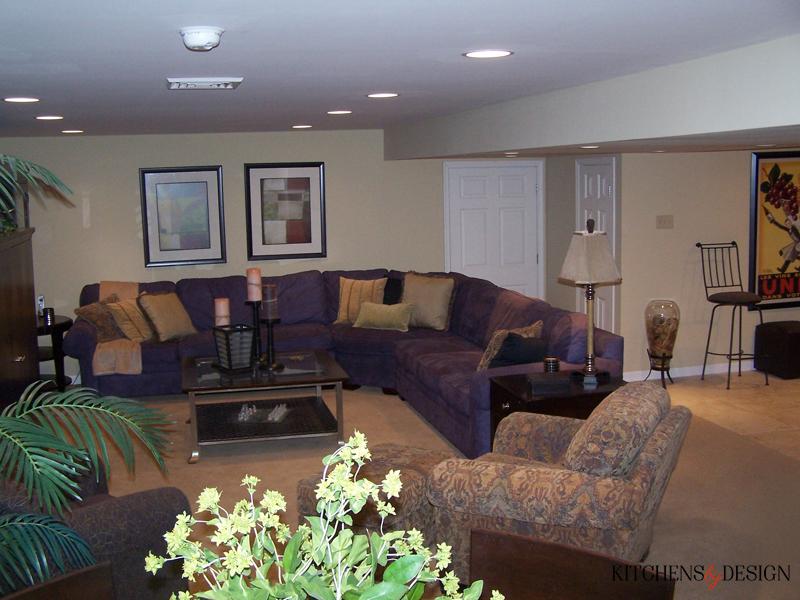 living area with couches, chairs, table